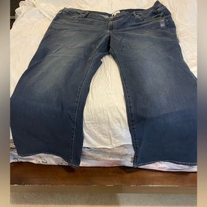 Never worn, mid rise boot cut jeans